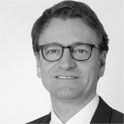 Dr Jan Peter Ohrtmann's headshot, grayscale