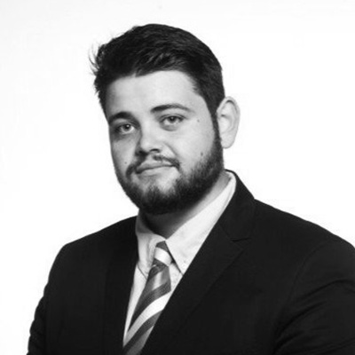 Enislav Enikov's headshot, grayscale