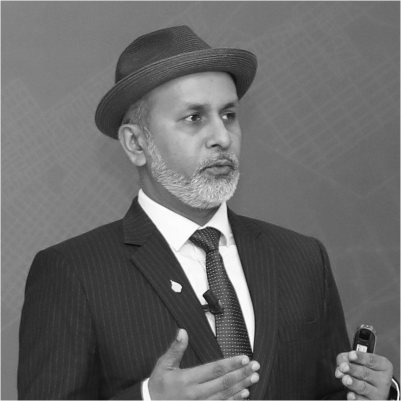 Imran Chowdhury's headshot, grayscale