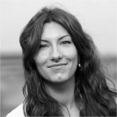 Laura Grava's headshot, grayscale