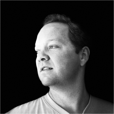 Ryan Walker's headshot, grayscale